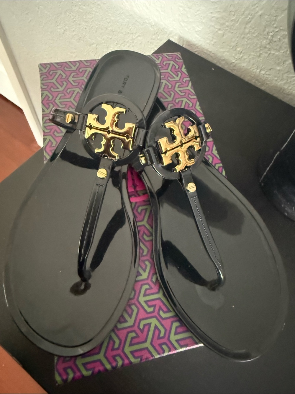 Tory Burch Mini Miller Black Patent Jelly Thong Sandals with Gold Logo Medallion